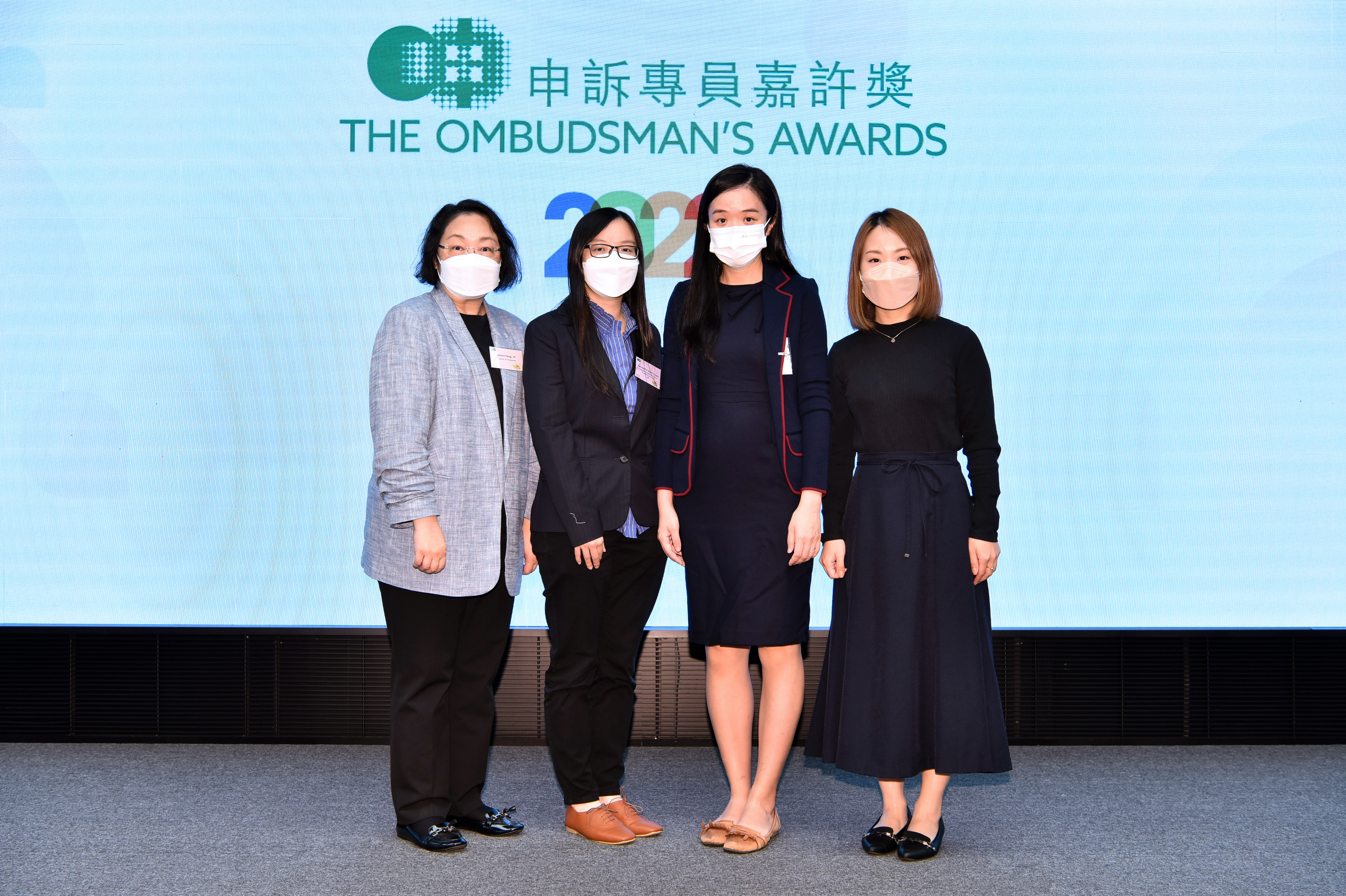 Miss Helen Tang, Registrar of Companies (first left), Ms Katrina Suen, Deputy Registry Manager (first right) and the awardees Ms Cindy Leung, Assistant Registry Manager (second left) and Ms Yan Wong, Companies Registration Officer I (second right) at the Award Presentation Ceremony.